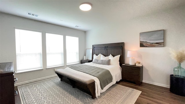 1605 Anacua Ln, Wylie, TX 75098 - bedroom with baseboards and wood finished floors