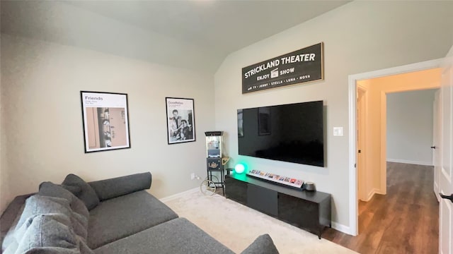 1605 Anacua Ln, Wylie, TX 75098 - living room featuring lofted ceiling, baseboards, and wood finished floors
