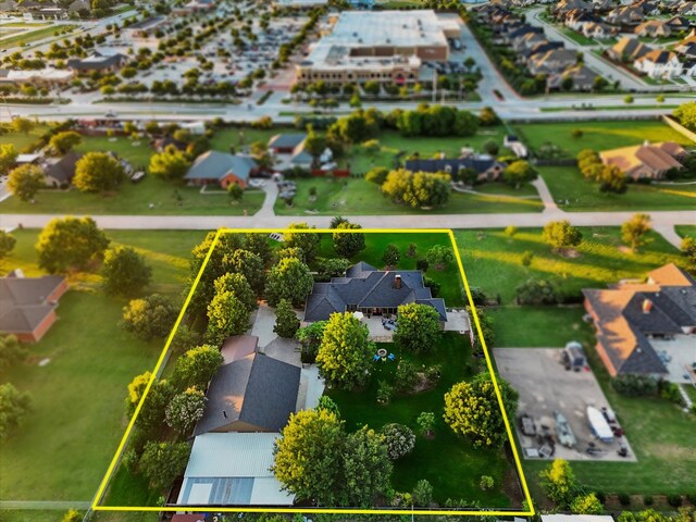 1208 Chandler Cir, Prosper, TX 75078 - aerial perspective of suburban area with property parcel outlined