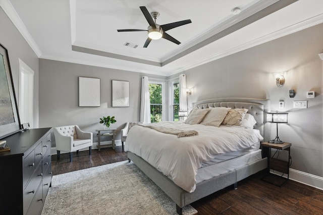 1208 Chandler Cir, Prosper, TX 75078 - bedroom featuring a raised ceiling, hardwood / wood-style flooring, crown molding, and ceiling fan