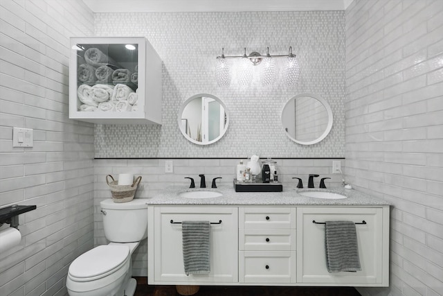 1208 Chandler Cir, Prosper, TX 75078 - bathroom with double vanity and tile walls