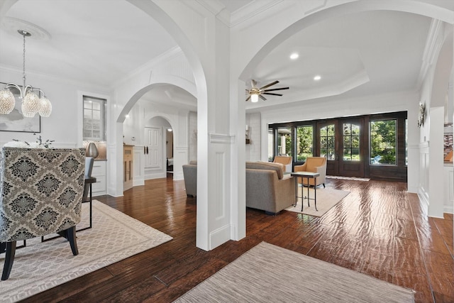 1208 Chandler Cir, Prosper, TX 75078 - entryway with ceiling fan, hardwood / wood-style floors, ornamental molding, a decorative wall, and a wainscoted wall