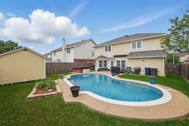 9829 Stoney Bridge Rd, Fort Worth, TX 76108 - view of swimming pool featuring a fenced backyard, a hot tub, a storage shed, and a patio area