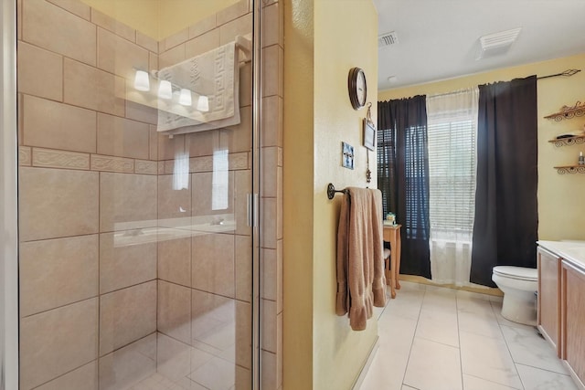 9829 Stoney Bridge Rd, Fort Worth, TX 76108 - bathroom featuring toilet, vanity, a stall shower, and tile patterned floors