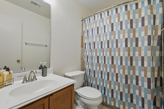 9829 Stoney Bridge Rd, Fort Worth, TX 76108 - bathroom with toilet, vanity, a textured wall, and curtained shower