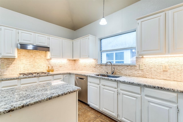 1104 Bayshore St, Allen, TX 75002 - kitchen with appliances with stainless steel finishes, a sink, under cabinet range hood, and white cabinetry