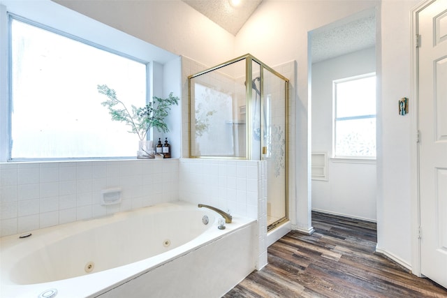 1104 Bayshore St, Allen, TX 75002 - full bathroom with a stall shower, a whirlpool tub, wood finished floors, and a textured ceiling