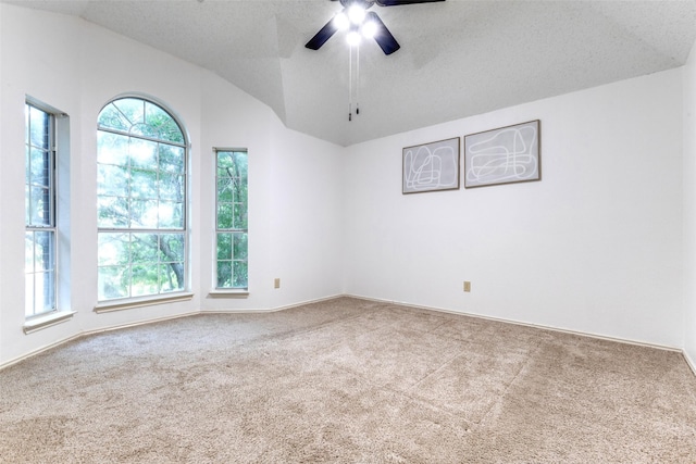 1104 Bayshore St, Allen, TX 75002 - spare room featuring carpet flooring, a ceiling fan, vaulted ceiling, and baseboards