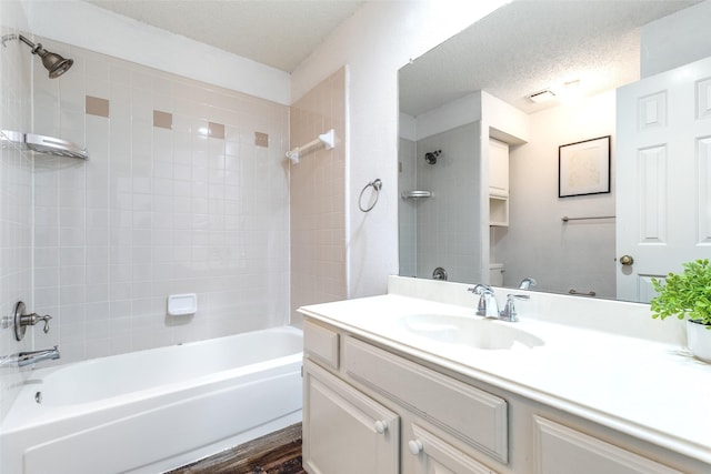 1104 Bayshore St, Allen, TX 75002 - bathroom with vanity, shower / tub combination, toilet, and a textured ceiling