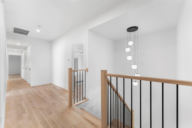 4516 Shenandoah Ave, University Park, TX 75205 - corridor with an upstairs landing, wood finished floors, recessed lighting, and baseboards