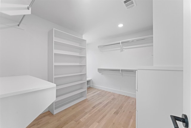 4516 Shenandoah Ave, University Park, TX 75205 - walk in closet featuring light wood finished floors
