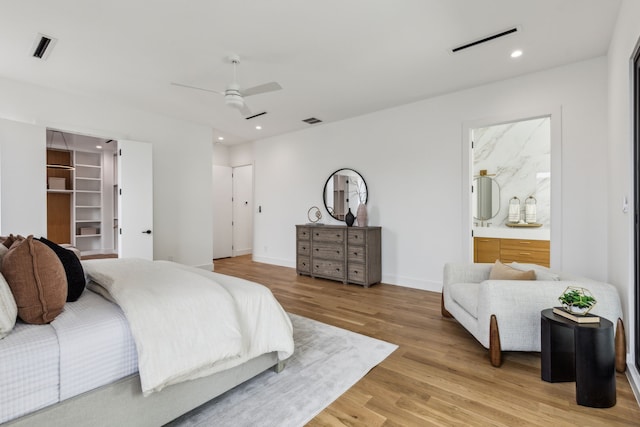 2031 Cullen Ave, Dallas, TX 75206 - bedroom with light wood-style flooring, recessed lighting, connected bathroom, a ceiling fan, and baseboards