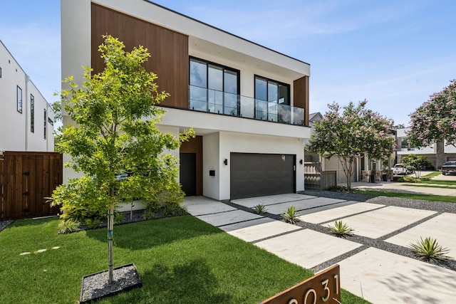 2031 Cullen Ave, Dallas, TX 75206 - contemporary house with concrete driveway, stucco siding, an attached garage, and a balcony
