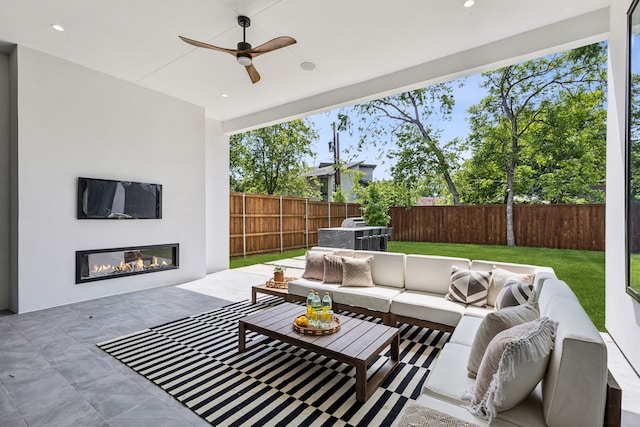 2031 Cullen Ave, Dallas, TX 75206 - view of patio with an outdoor living space with a fireplace and a ceiling fan
