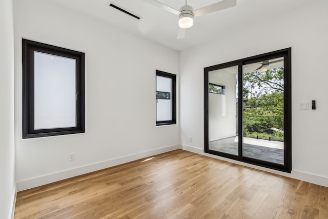2031 Cullen Ave, Dallas, TX 75206 - spare room featuring light wood finished floors, ceiling fan, and baseboards