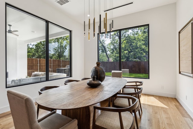 2031 Cullen Ave, Dallas, TX 75206 - dining room with healthy amount of natural light, light wood finished floors, and a ceiling fan