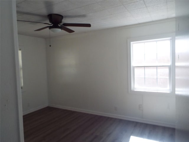 337 W Coral Way, Grand Prairie, TX 75051 - spare room featuring wood finished floors, ceiling fan, and baseboards