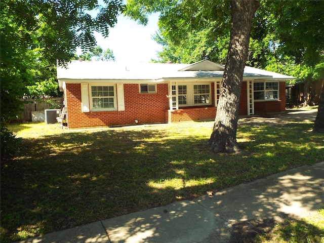 337 W Coral Way, Grand Prairie, TX 75051 - view of front of house with brick siding and central air condition unit