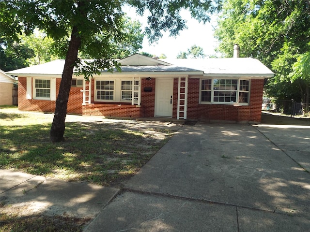 337 W Coral Way, Grand Prairie, TX 75051 - single story home with brick siding and driveway