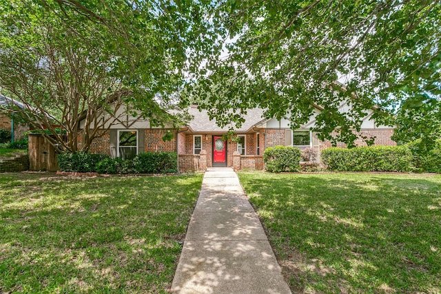 2831 Creekwood Ct, Grapevine, TX 76051 - english style home featuring brick siding and a front lawn