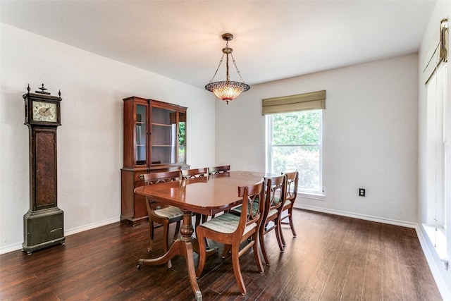 2831 Creekwood Ct, Grapevine, TX 76051 - dining room featuring dark wood-type flooring and baseboards