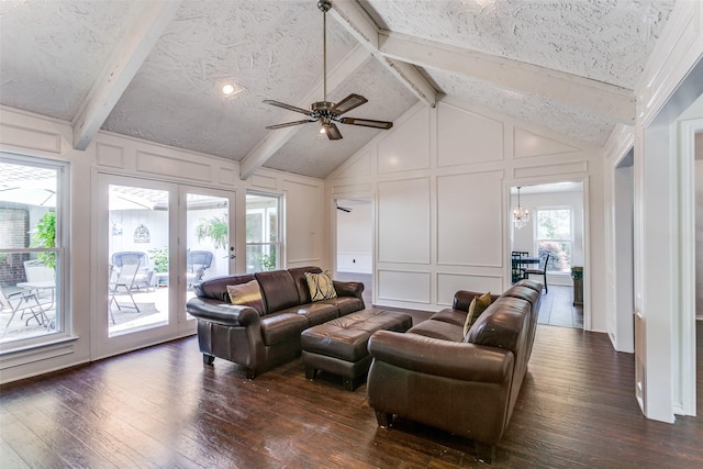 2831 Creekwood Ct, Grapevine, TX 76051 - living area featuring a decorative wall, dark wood finished floors, ceiling fan, a chandelier, and french doors