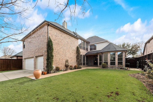 1542 Sandia Ln, Frisco, TX 75033 - back of house featuring brick siding, concrete driveway, a chimney, an attached garage, and a shingled roof