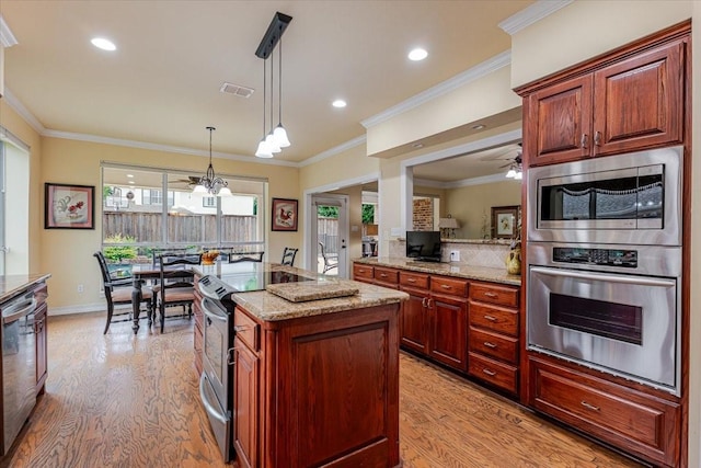 6717 Savannah Ln, Fort Worth, TX 76132 - kitchen featuring appliances with stainless steel finishes, light wood-style floors, light stone counters, ornamental molding, and ceiling fan