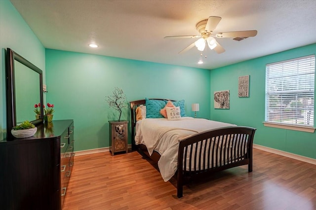 6717 Savannah Ln, Fort Worth, TX 76132 - bedroom featuring wood finished floors, baseboards, ceiling fan, and recessed lighting