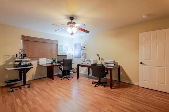 6717 Savannah Ln, Fort Worth, TX 76132 - home office with wood finished floors, a ceiling fan, and baseboards