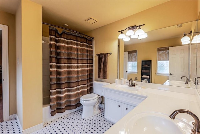 6717 Savannah Ln, Fort Worth, TX 76132 - bathroom with toilet, double vanity, and shower / bath combination with curtain
