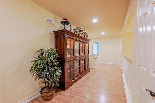 6717 Savannah Ln, Fort Worth, TX 76132 - hallway with an upstairs landing, light wood-style flooring, baseboards, and recessed lighting