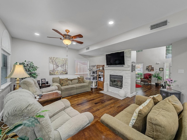 525 Sir Roland Dr, Grand Prairie, TX 75052 - living area with a stone fireplace, a ceiling fan, dark wood-style floors, and recessed lighting