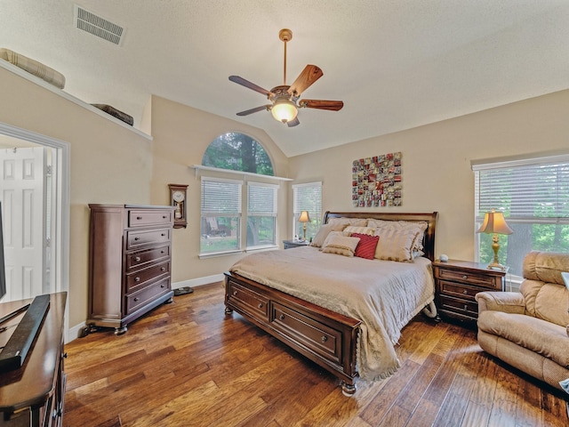 525 Sir Roland Dr, Grand Prairie, TX 75052 - bedroom featuring hardwood / wood-style flooring, vaulted ceiling, a ceiling fan, and baseboards