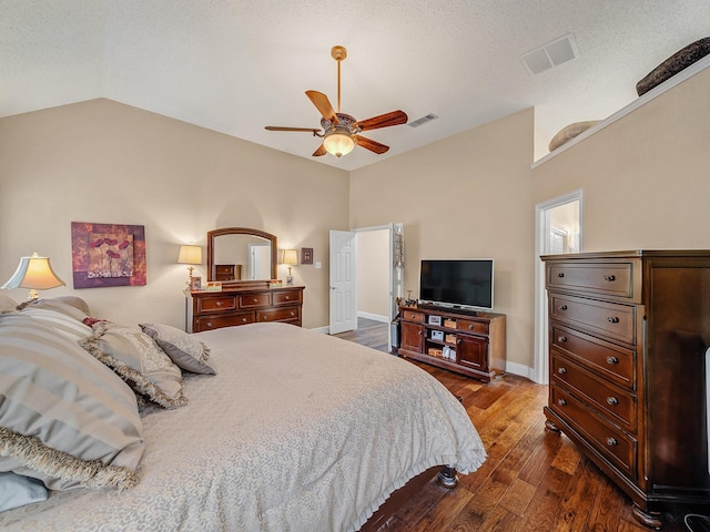 525 Sir Roland Dr, Grand Prairie, TX 75052 - bedroom with vaulted ceiling, dark wood-style floors, baseboards, and a ceiling fan
