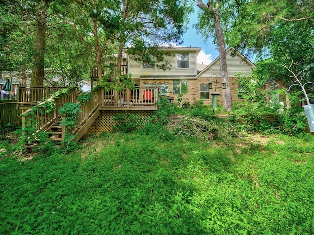 525 Sir Roland Dr, Grand Prairie, TX 75052 - rear view of property featuring a wooden deck and brick siding