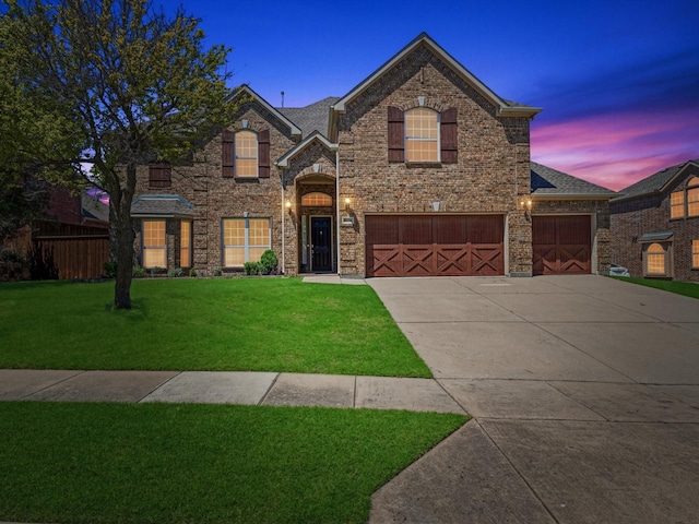 2231 Cold Water Dr, Prosper, TX 75078 - traditional home featuring driveway, brick siding, and an attached garage