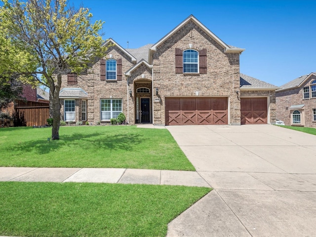 2231 Cold Water Dr, Prosper, TX 75078 - traditional-style house featuring brick siding, concrete driveway, and a garage