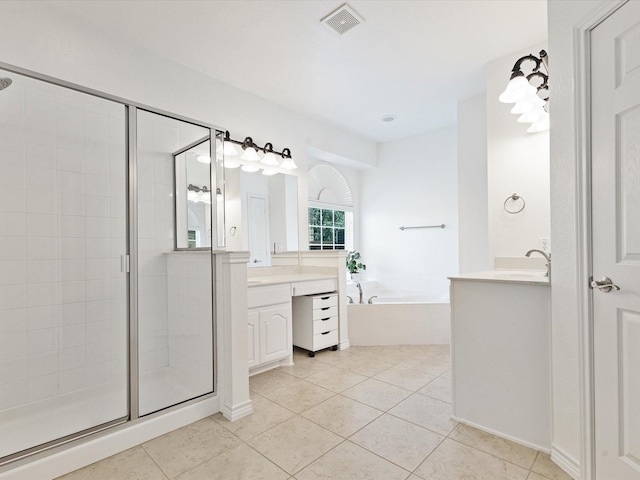 2231 Cold Water Dr, Prosper, TX 75078 - bathroom featuring two vanities, a bath, a stall shower, and tile patterned flooring