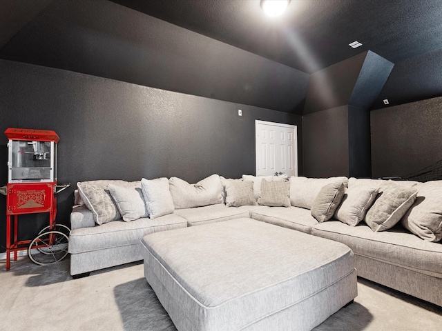 2231 Cold Water Dr, Prosper, TX 75078 - carpeted home theater room with lofted ceiling