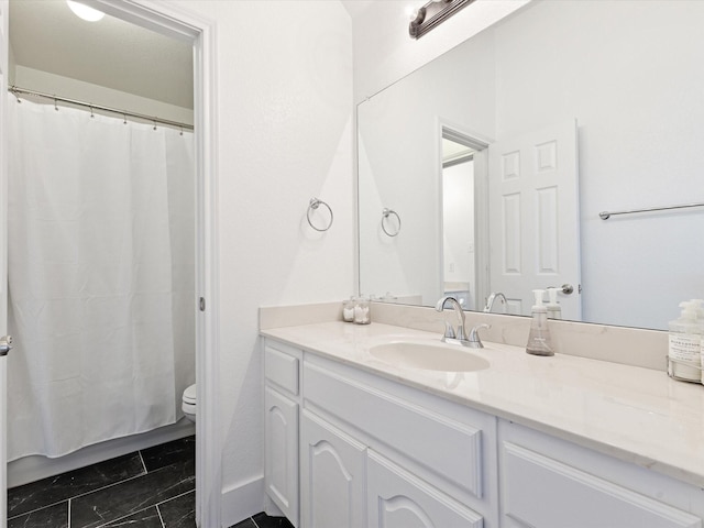 2231 Cold Water Dr, Prosper, TX 75078 - full bath featuring vanity, toilet, marble finish flooring, and a shower with curtain
