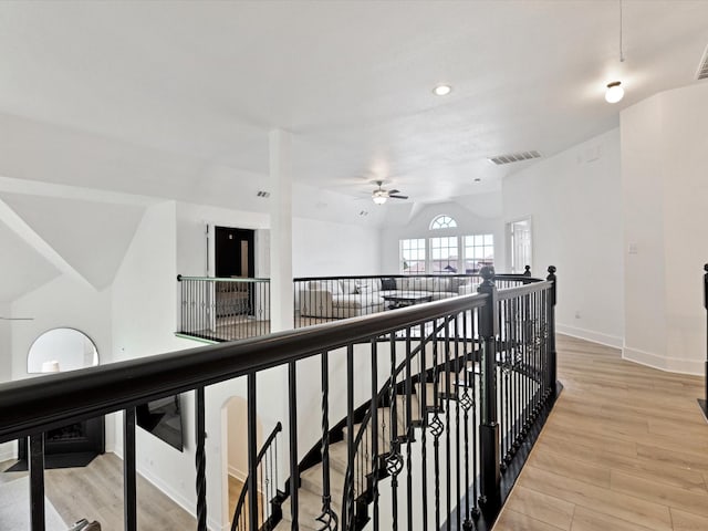 2231 Cold Water Dr, Prosper, TX 75078 - corridor featuring an upstairs landing, light wood finished floors, vaulted ceiling, baseboards, and recessed lighting