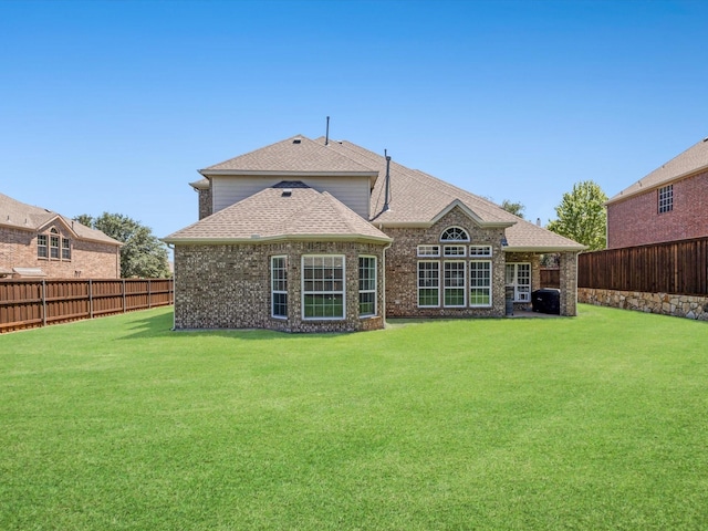 2231 Cold Water Dr, Prosper, TX 75078 - rear view of house with a shingled roof and brick siding