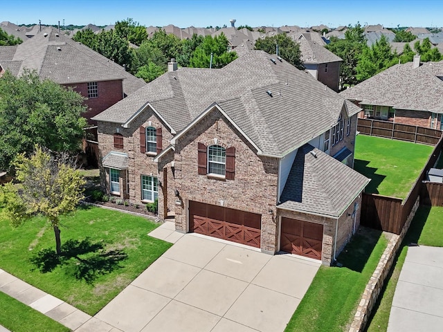 2231 Cold Water Dr, Prosper, TX 75078 - view of front of property featuring a shingled roof, an attached garage, a chimney, driveway, and brick siding