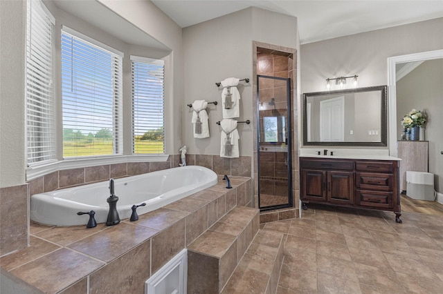 204 Lost Spur Ln, Royse City, TX 75189 - full bathroom with a stall shower, a bath, and vanity