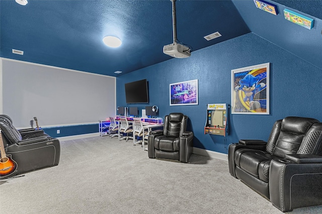 204 Lost Spur Ln, Royse City, TX 75189 - cinema with a textured wall, carpet, vaulted ceiling, baseboards, and a textured ceiling