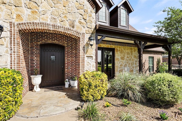 204 Lost Spur Ln, Royse City, TX 75189 - view of exterior entry with stone siding and brick siding