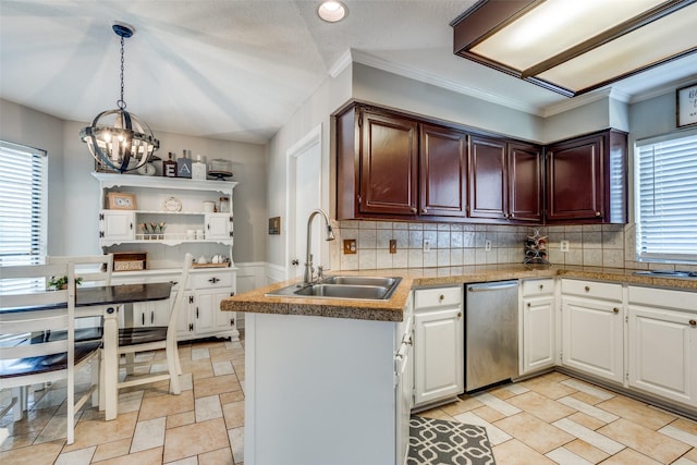 2332 Heatherwoods Way, Carrollton, TX 75007 - kitchen featuring a sink, a chandelier, stainless steel dishwasher, healthy amount of natural light, and crown molding
