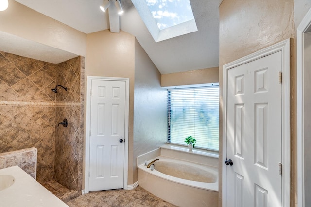 2332 Heatherwoods Way, Carrollton, TX 75007 - full bath featuring a garden tub, tiled shower, a skylight, lofted ceiling, and tile patterned floors
