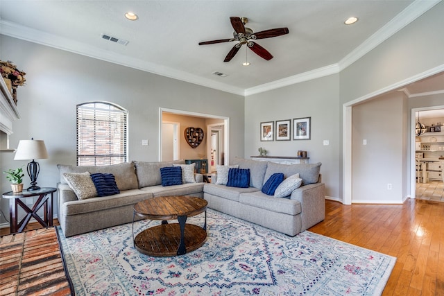 2332 Heatherwoods Way, Carrollton, TX 75007 - living room with ceiling fan, crown molding, wood-type flooring, recessed lighting, and baseboards